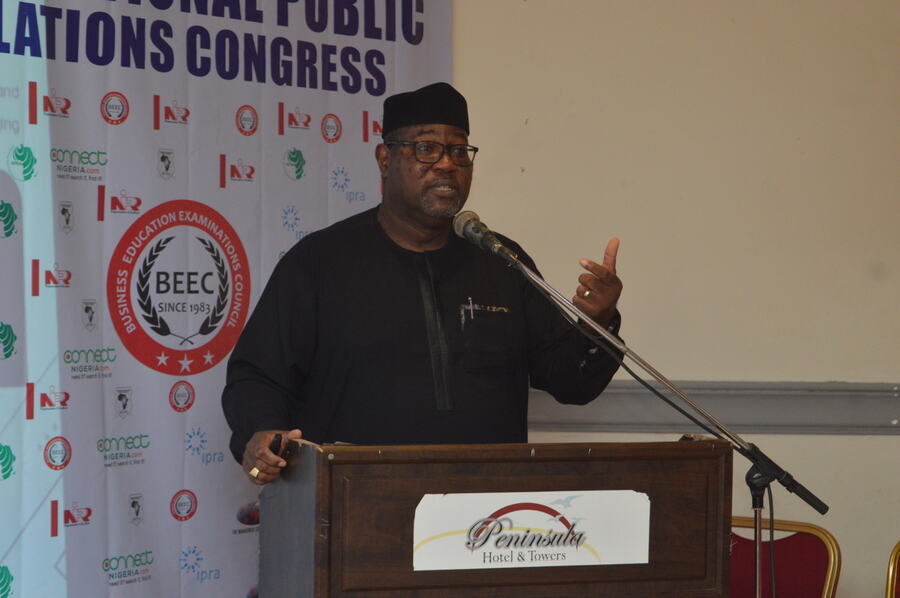 A speaker addressing delegates from the podium